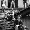 �.���